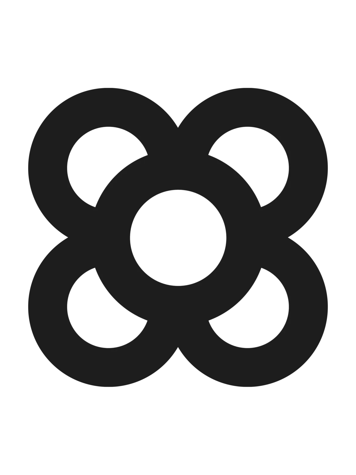 Black four-petal flower motif of Barcelona's panot paving tile, formed by four overlapping rings.